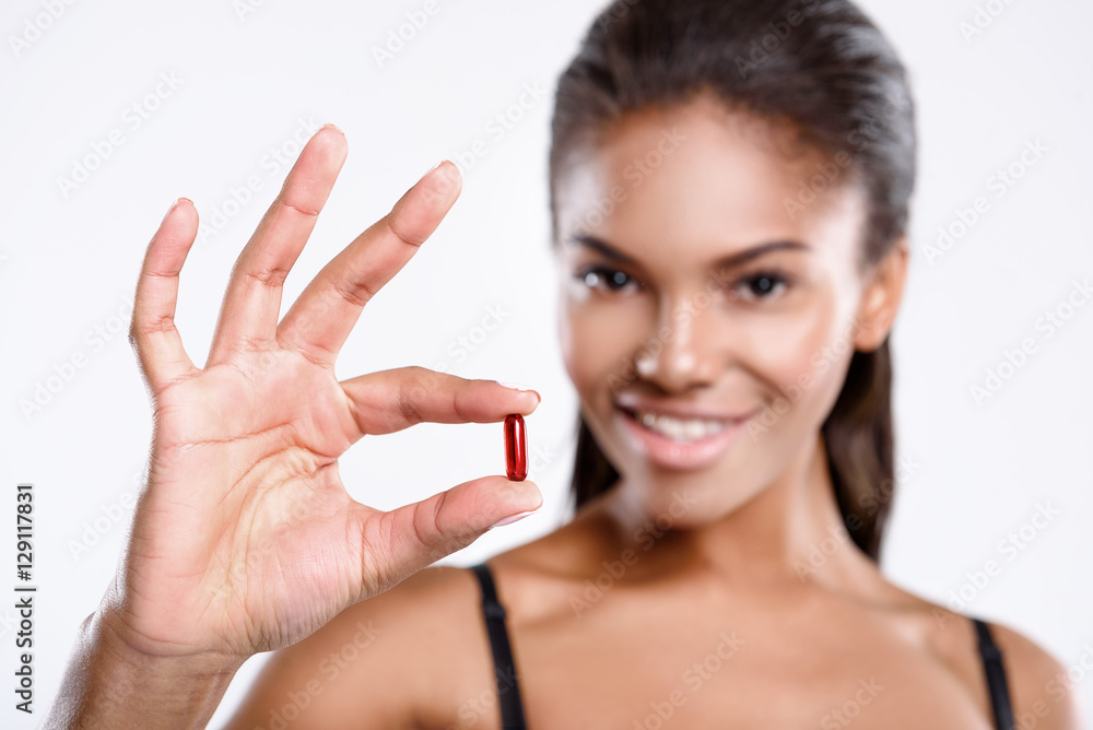 Smiling model is presenting medical supplies Smiling model is presenting medical supplies