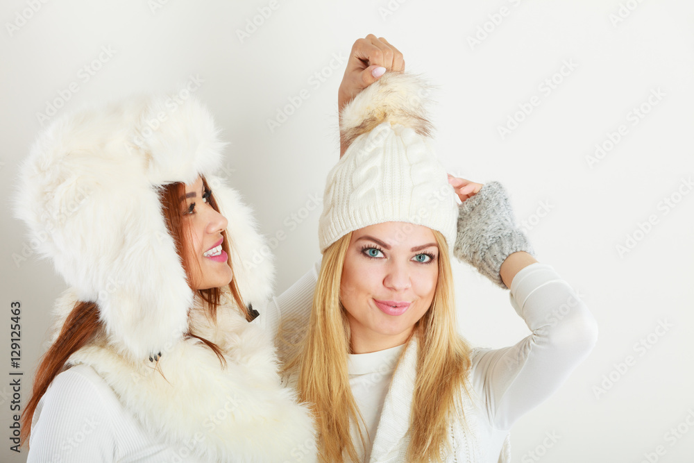 Two women with winter clothes. Two women with winter clothes.