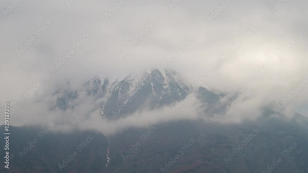 Time lapse of mountain with snow and cloud motion Time lapse of mountain with snow and cloud motion