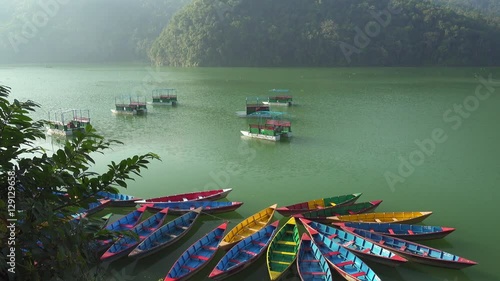 Colour boats on Phewa lake. Pokhara, Nepal
 photo