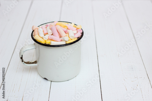 Cup of hot cocoa with color marshmallow