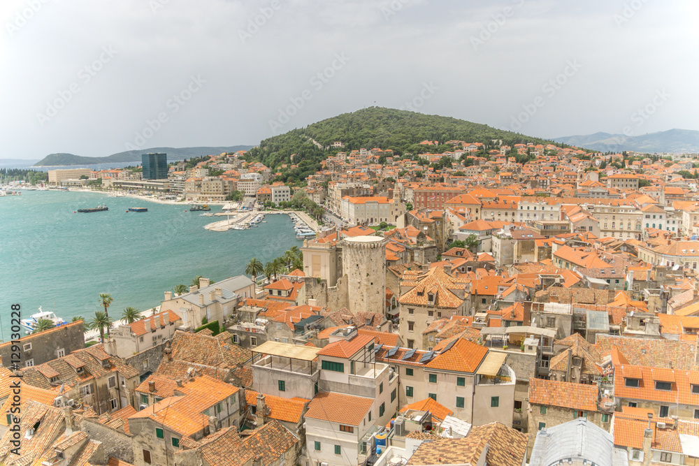 A high angle view of the Croatian town of Split, from the medieval St Dominus' Bell Tower, with a view of the port of Split and the Diocletian's Palace.