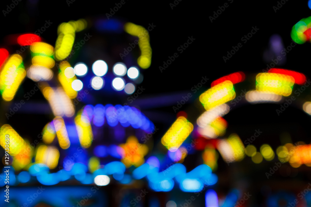 Blurred bokeh light in amusement park