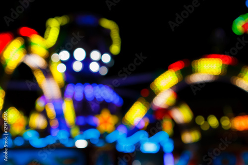 Blurred bokeh light in amusement park