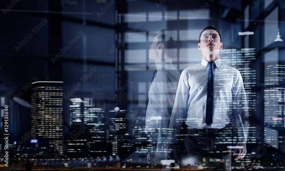 Fototapeta premium Businessman in modern office. Mixed media . Mixed media