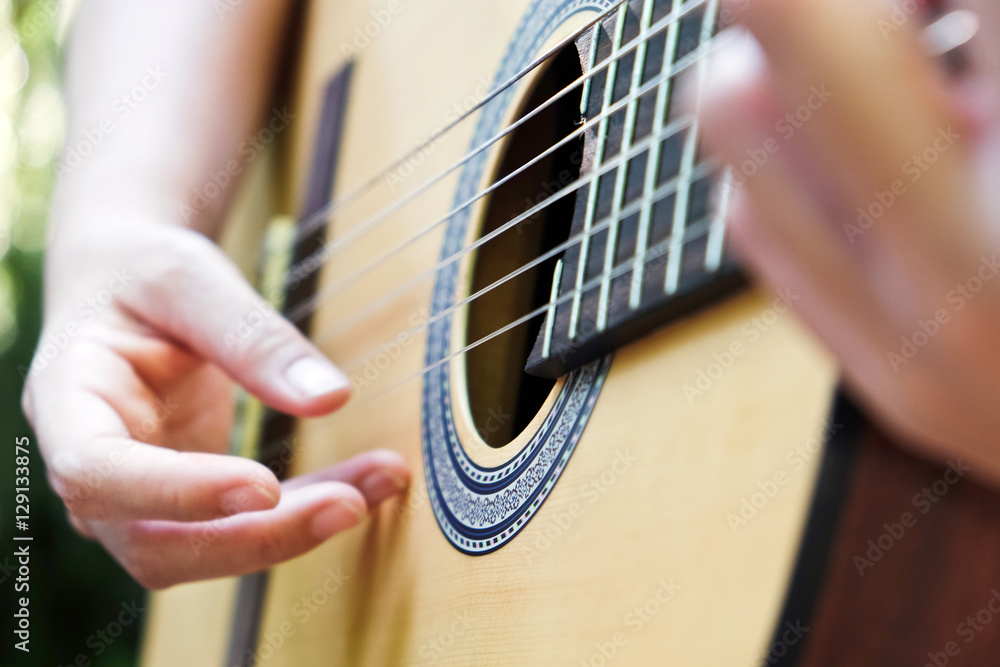 Fototapeta premium playing acoustic guitar background
