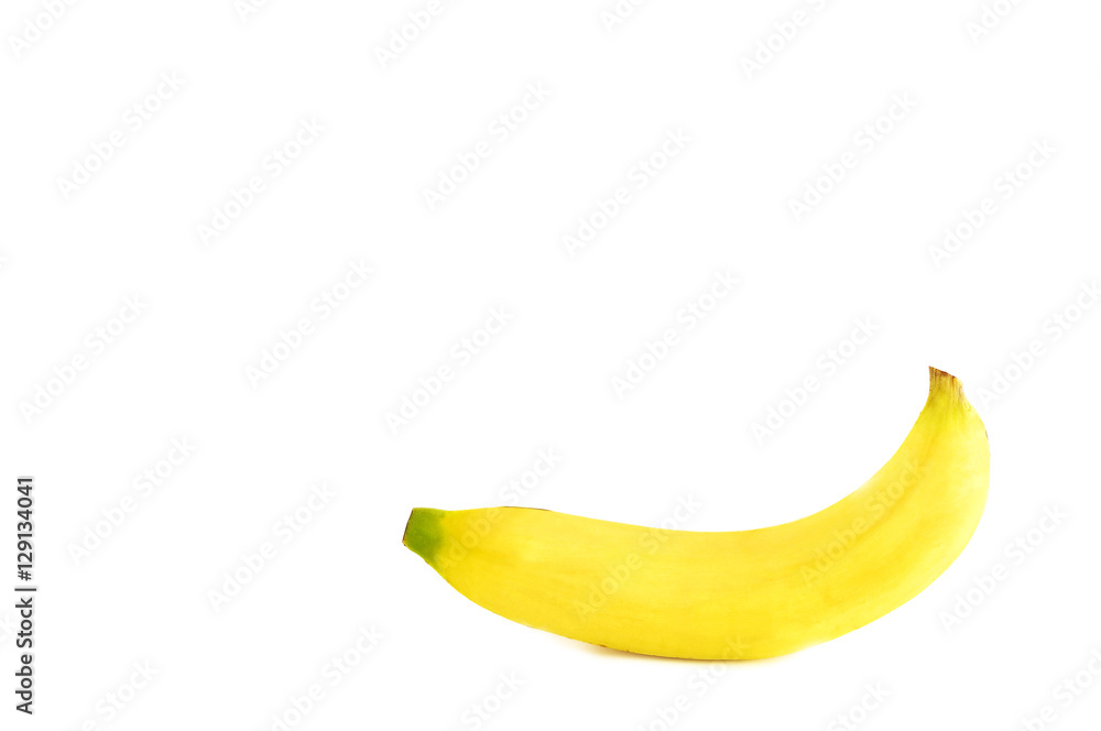 Single yellow banana on white background