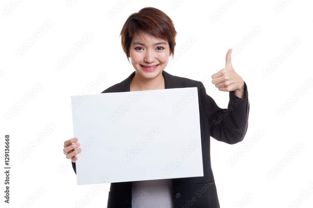 Young Asian business woman show thumbs up with white blank sign Young Asian business woman show thumbs up with white blank sign