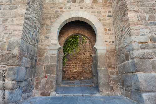 Medieval doorway in the shape of a key with arch 