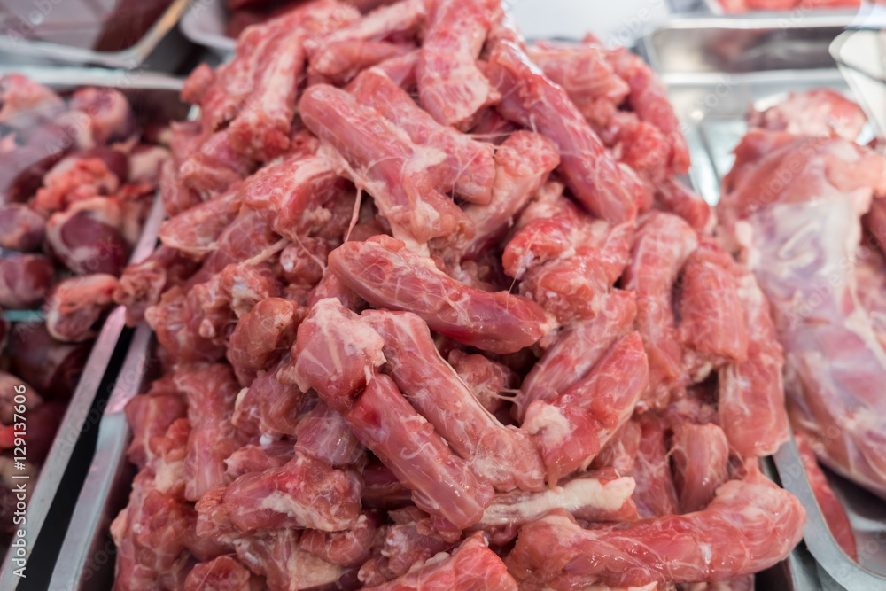 Raw chicken necks for sale at the city farmers market Raw chicken necks for sale at the city farmers market
