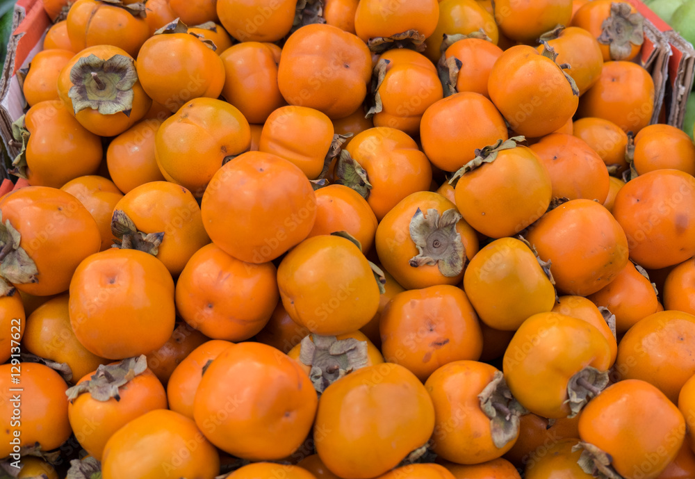 New fresh persimmon at city market for sale