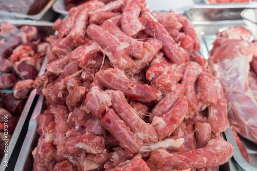 Raw chicken necks for sale at the city farmers market