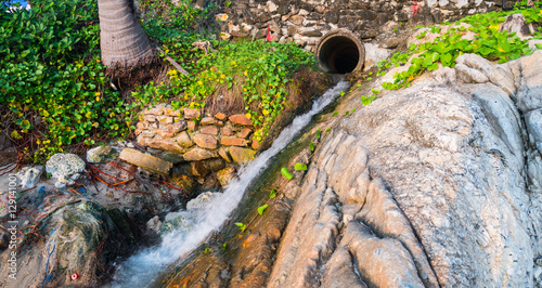 Wallpaper Mural Wastewater discharge pipe at the beach. Torontodigital.ca