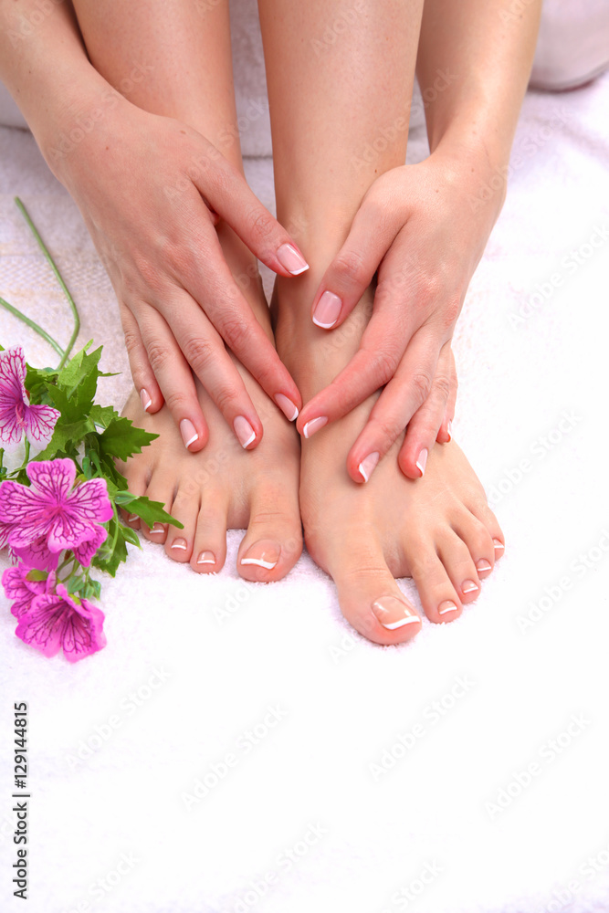 Fototapeta premium Closeup photo of a beautiful female feet with pedicure