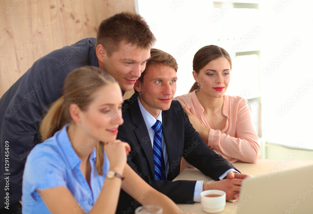 Business meeting - manager discussing work with his colleagues Business meeting - manager discussing work with his colleagues