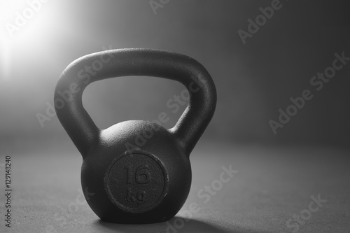 Fototapeta Naklejka Na Ścianę i Meble -  Close up of kettlebell weights on floor gym. Fitness and a healt