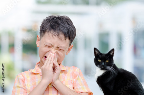 Little Asian boy has allergies with fur particles allergy fever