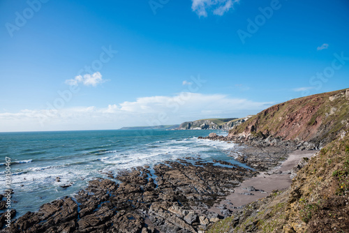 View of cliffs and ocean at Challaborough , United Kingdom photo