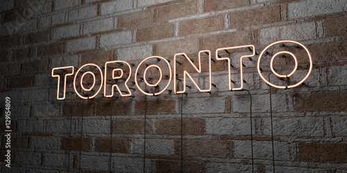 Photography TORONTO - Glowing Neon Sign on stonework wall - 3D rendered royalty free stock illustration