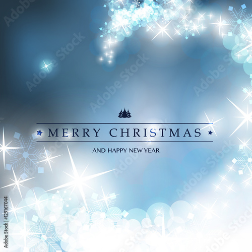 Blue and White Happy Holidays, Merry Christmas Greeting Card With Label on a Sparkling Blurred Background