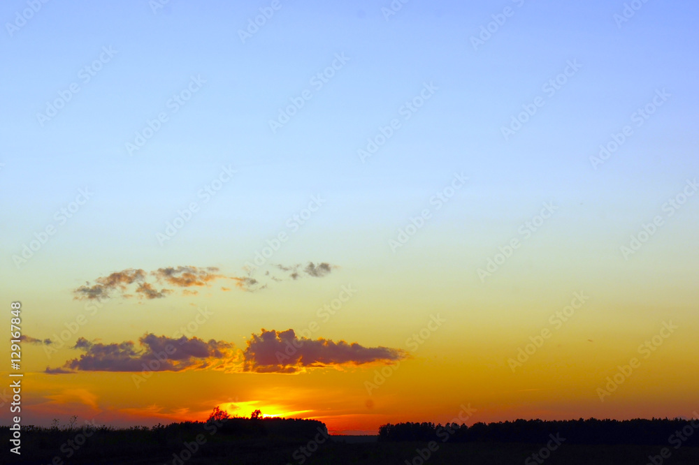 Landscape Sunset, sky, clouds and dark forest Landscape Sunset, sky, clouds and dark forest