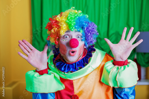 Clown with queer expression on his face.