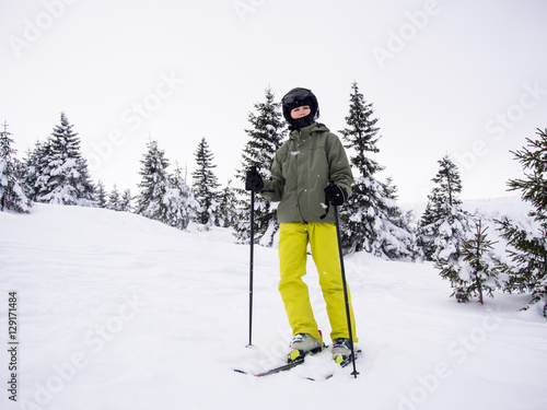 Teenage boy skiing 