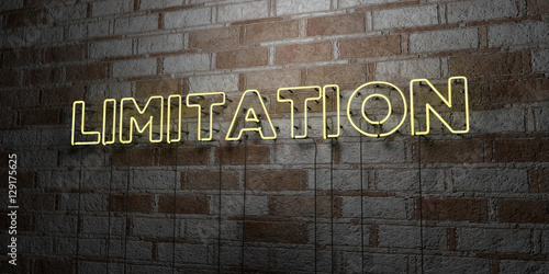 LIMITATION - Glowing Neon Sign on stonework wall - 3D rendered royalty free stock illustration.  Can be used for online banner ads and direct mailers.. photo