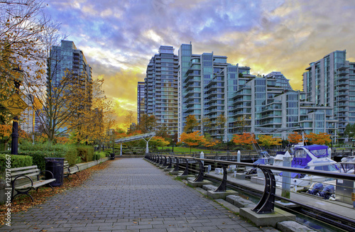 Paved pathway along Coal Harbour in Vancouver, Canada. photo