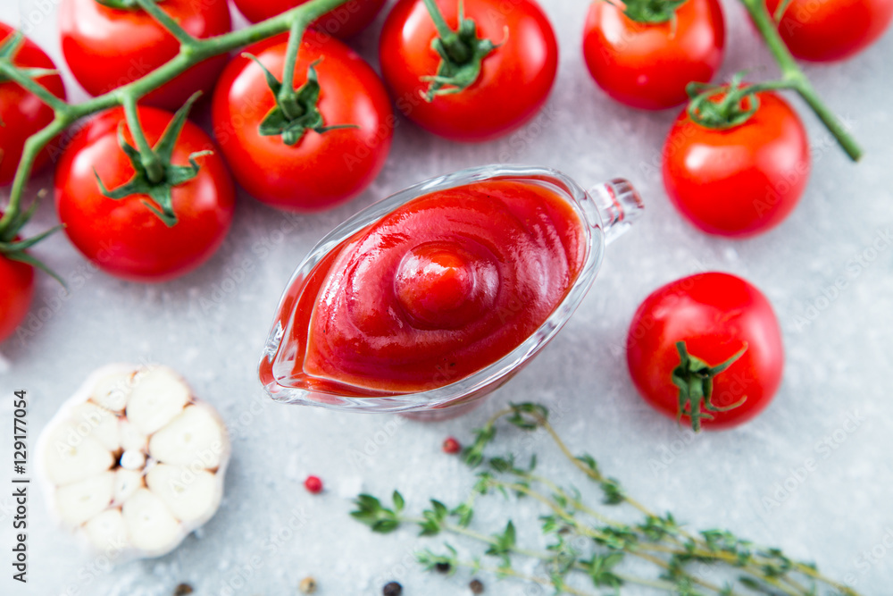 Tomato ketchup sauce with garlic, spices and herbs with cherry t Tomato ketchup sauce with garlic, spices and herbs with cherry t