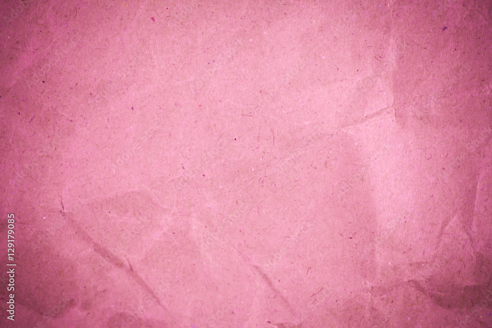 Fototapeta premium Pink crumpled recycle paper background.