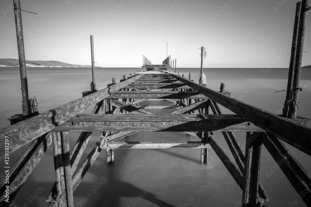 Old iron bridge in sea