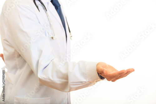 Doctor offering a hand on white background