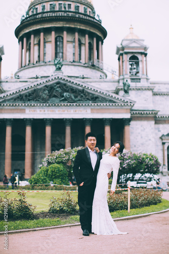 Bride and groom on the background of St. Isaac's Cathedral © cmirnovalexander