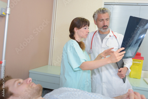 doctors looking at x-ray