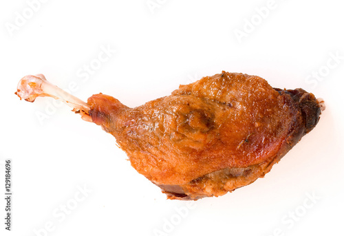 Roast duck leg on white background