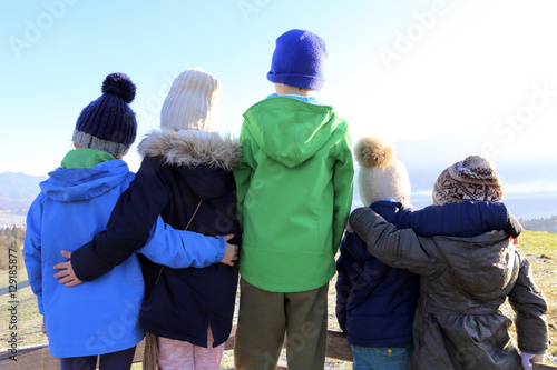 kids in winter waiting for snow photo