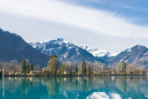Reflection of Alps on the lake Brienz in Interlaken, Switzerland
