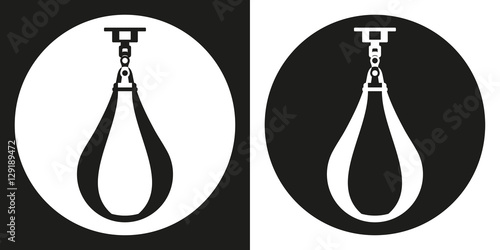 Punching bag icon. Silhouette punching bag on a black and white background. Sports Equipment. Vector Illustration.