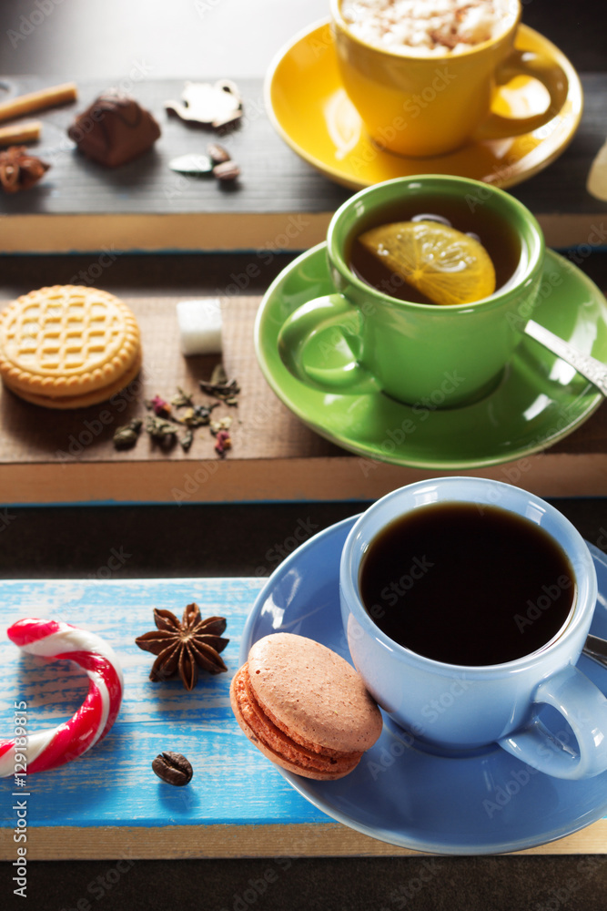 Fototapeta premium cup and saucer at colorful paper