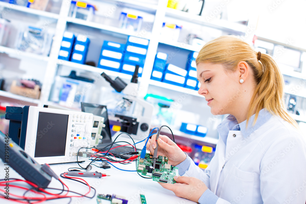Engineer working with circuits. A woman engineer Engineer working with circuits. A woman engineer