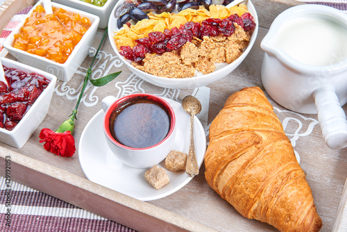 French breakfast on a wooden tray