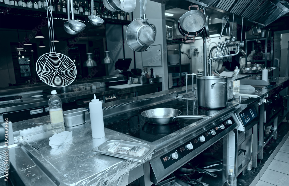 Fototapeta premium Professional kitchen interior, toned