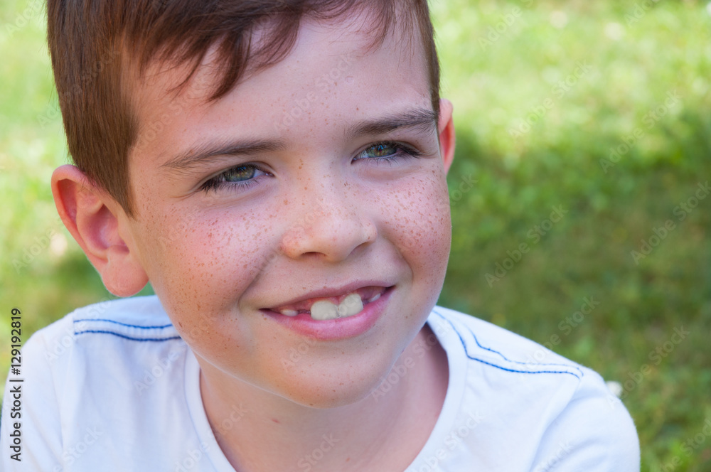 Portrait of a smiling boy outdoors Portrait of a smiling boy outdoors