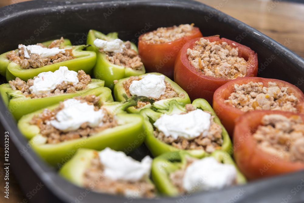 Peppers and tomatoes stuffed with meat Peppers and tomatoes stuffed with meat