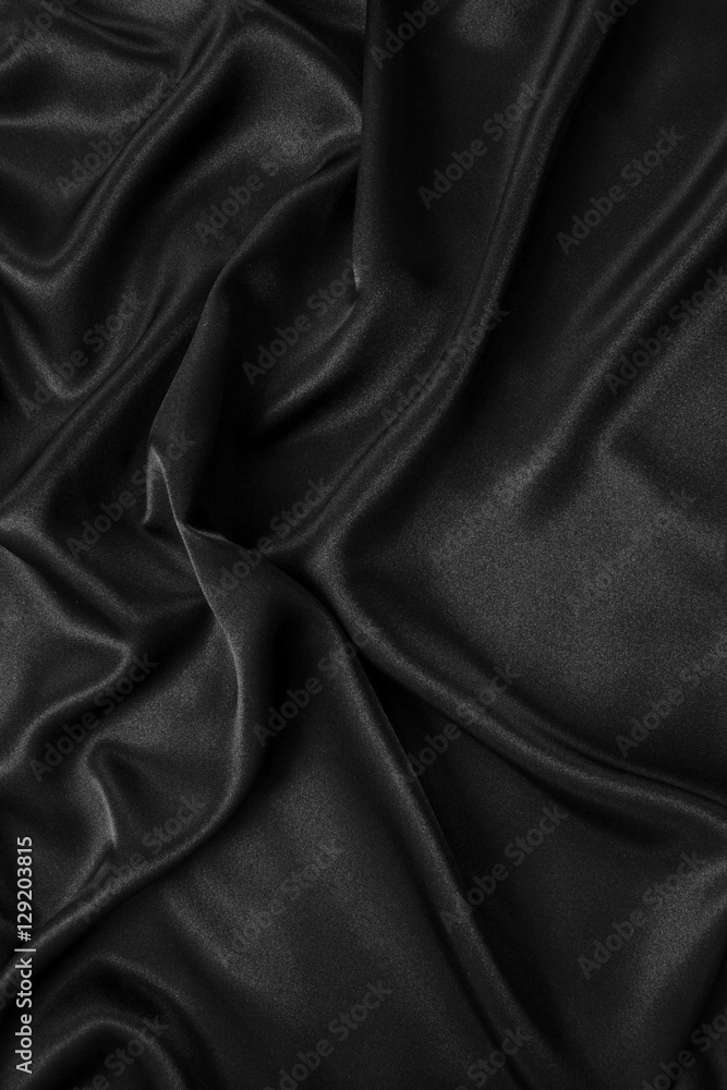 Obraz premium Black silk fabric background