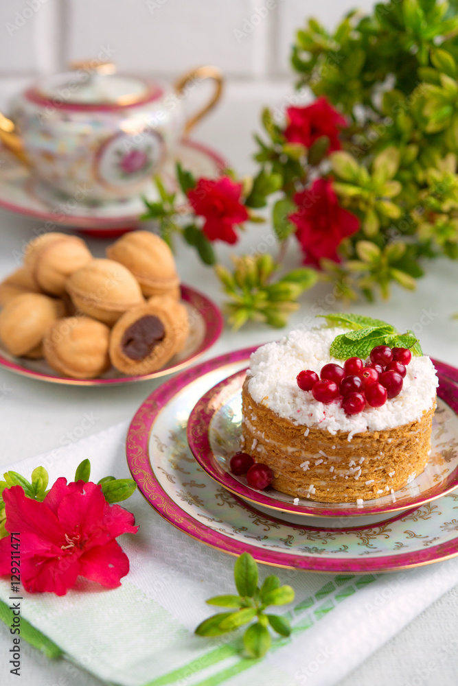 Breakfast with pastries and a drink on a light background Breakfast with pastries and a drink on a light background
