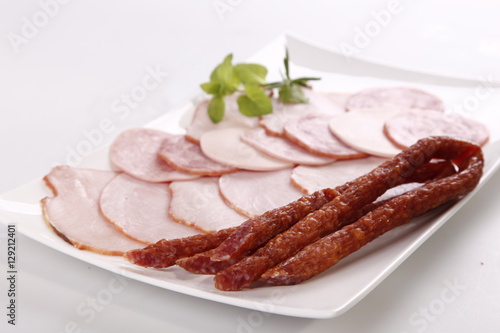 kabanos and ham on white background 