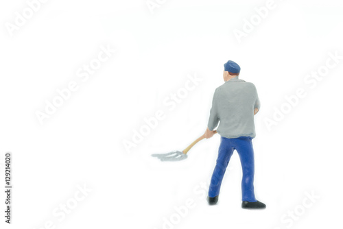 Miniature people Track workers concept on white background with