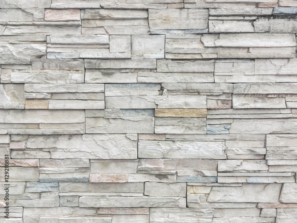 Closeup surface brick pattern at old stone brick wall textured background Closeup surface brick pattern at old stone brick wall textured background